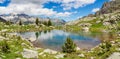 Perramo lake and Perdiguero peak at baclground in Benasque Valley, Spain