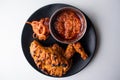 Perri Perri grilled Chicken wwith chili sauce served in a dish isolated on grey background top view of bangladesh food