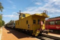 Perris, CA, USA - August 24, 2023: Bright yellow vintage railroad caboose in Hazen, Arkansas Royalty Free Stock Photo