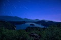 Perseid MEteor Shower over Bled Lake at Starry Dark Night in Summer