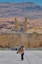 Entrance of Persepolis with iranian women.