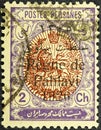 Persia, circa 1926. Canceled postage stamp printed by Persia, overprinted in memory of the Pahlavi dynasty, circa 1926.