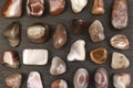 Persian agate rare stones texture on black stone background