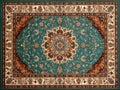 Persian carpet in blue and brown color with antique pattern on the floor top view