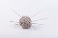 Persian cat raw wool yarn coiled into a ball Royalty Free Stock Photo