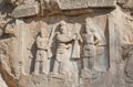 Persian kings on stone relief of the monument Taq-e Bostan in Iran. Taq-e Bostan is rock relief from 4 century Royalty Free Stock Photo