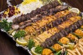 Close up of Persian Mix Kebab consist of minced meat chicken and steak with rice in large tray Royalty Free Stock Photo