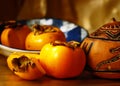 Persimmon in Blue Bowl