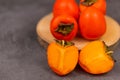 Persimmon on a dark background