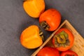 Persimmon on a dark background