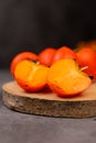 Persimmon on a dark background