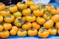 Persimmon Fruits on shelve in fruit market