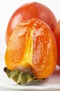 Persimmon slice Royalty Free Stock Photo