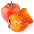 Persimmon with slice Royalty Free Stock Photo