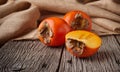 Persimmon on a wooden background