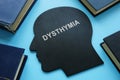 Persistent depressive disorder PDD dysthymia written on a head shape