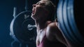 A Persistent Female Bodybuilder Enduring the Workout Pain of Exercising. Portrait of a Woman