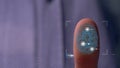 Person accessing a hologram with a fingerprint. Man, access to a modern hologram of a personal database with the discovery of fing