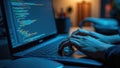 A Person is Actively Typing on a Laptop as Colorful Programming Code Fills the Screen