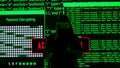 Person against big digital wall in studio. Man hacker in virtual reality glasses hacking database, digital screen cyber