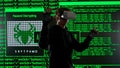 Person against big digital wall in studio. Man hacker in virtual reality glasses hacking database, digital screen cyber