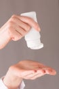Person applying hand sanitizer gel