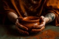 Person applying henna cream to their skin, with a sense of ritual and self-care. The image should convey a sense of relaxation and