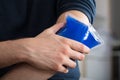 Person Applying Ice Gel Pack On An Injured Elbow Royalty Free Stock Photo