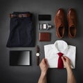 Person Arranging Male Business Clothing And Digital Tablet