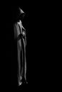 Person in black cloak. Royalty Free Stock Photo