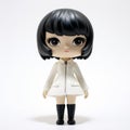 Charlotte: A Minimalistic Vinyl Toy With Black Hair And A Big White Coat