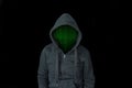 Person in a black hoodie with a green matrix of numbers instead of a face