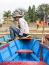 Person on a boat, fisherman in a boat