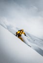 A person in bright jacket is skiing in high mountains. Tyrol, Austria . Sunny weather