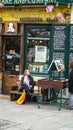 Shakespeare and Company book shop in Paris person browsing