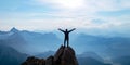 Person Celebrates Success Atop A Mountain, Arms Spread Wide To Embrace New Opportunities