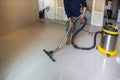 The person  cleaning floor with professional equipment in the living room.. cleaning concept Royalty Free Stock Photo