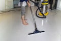 The person  cleaning floor with professional equipment in the living room Royalty Free Stock Photo