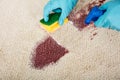 Person Cleaning Stain On Carpet