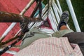 Person climbing a triangular guyed lattice mast near Santa Elena village, Costa Ri Royalty Free Stock Photo