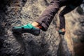 Person climbing while wearing rock climbing shoes Royalty Free Stock Photo