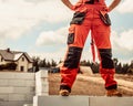 Person on construction site wearing workwear