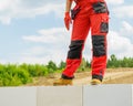 Person on construction site wearing workwear