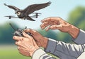 A person is controlling a bird-shaped drone using a remote Royalty Free Stock Photo