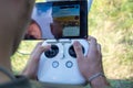 Person Controlling Drone with Remote and Live Video Feed Royalty Free Stock Photo