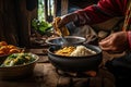 person, cooking authentic colombian meal, with ingredients and spices visible