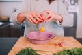 A person cooking eggs