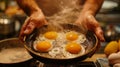 Person cooking eggs in a pan. Royalty Free Stock Photo