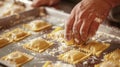 A person is cooking ravioli on a hot pan, filling the air with the aroma of Italian cuisine