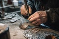 person, crafting intricate metalwork for foundry products